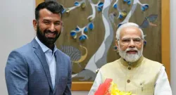 cheteshwar pujara with side by side pm modi