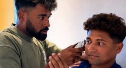 mohammed siraj turns hairdresser for sarfaraz khan gives him a haircut ahead of sri lanka series
